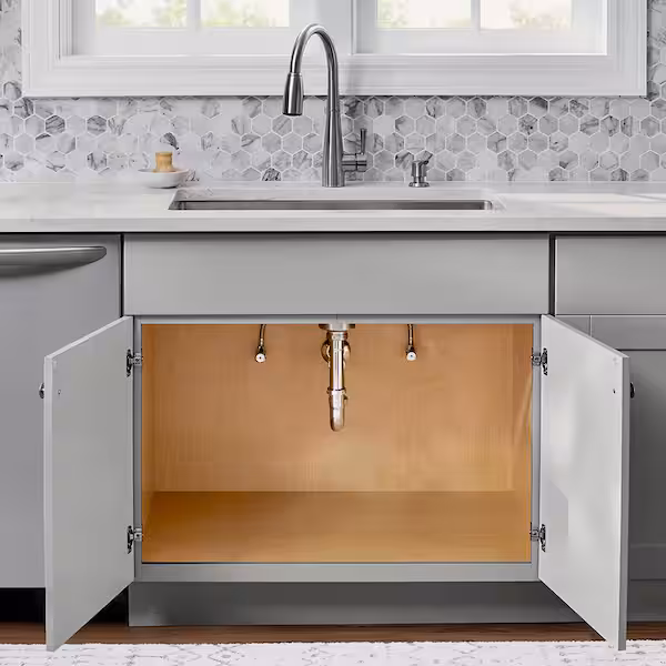 Open sink base cabinet under a kitchen sink